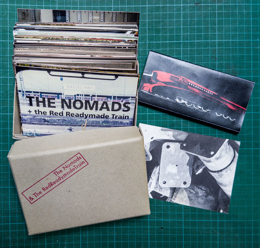 the-nomades-and-the-train-karton-postkarten-schokolade
